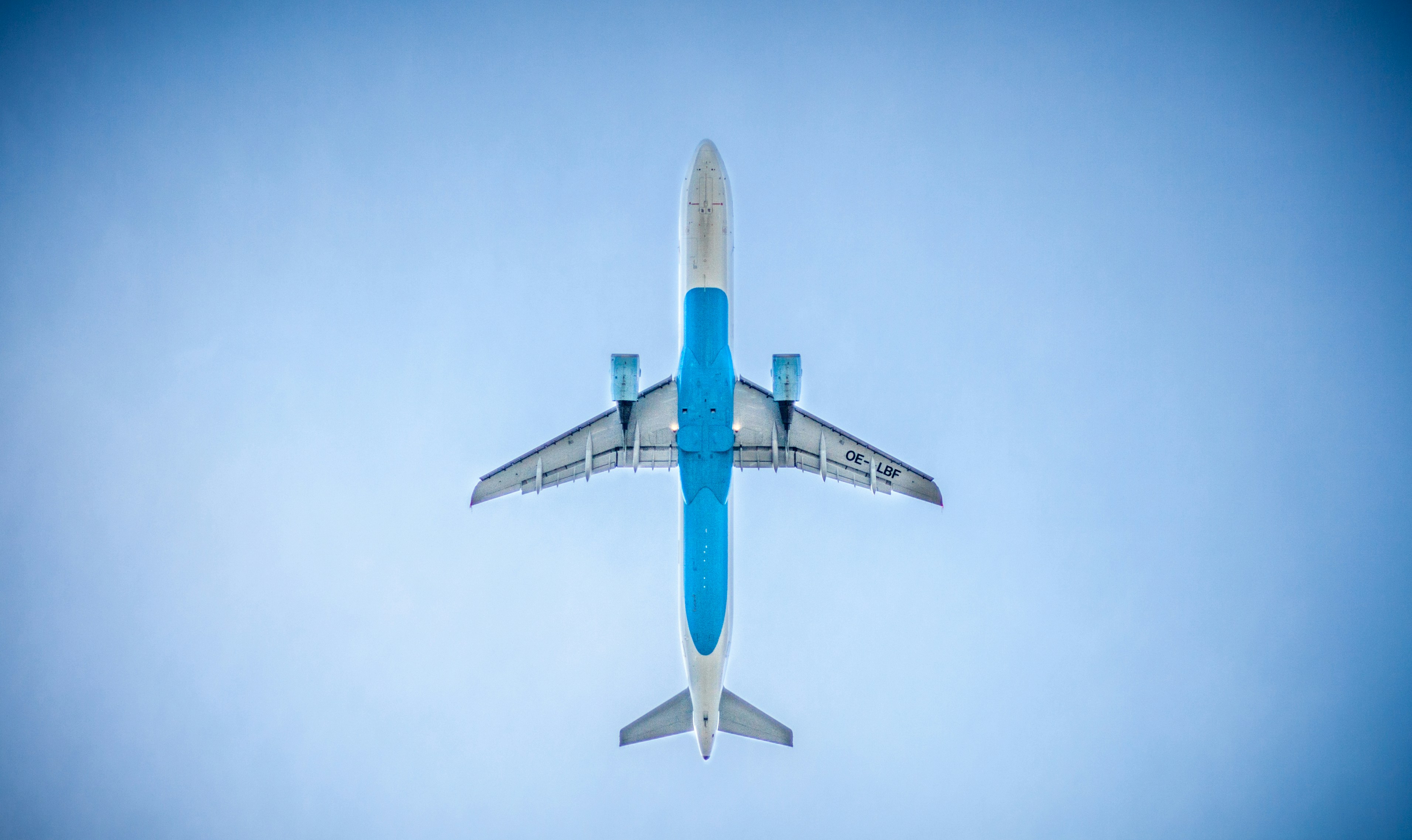 ALT + Hire Debt Collection Agency + Choose the right Collection Agency + picture + blue sky + looking up at bottom of airplane