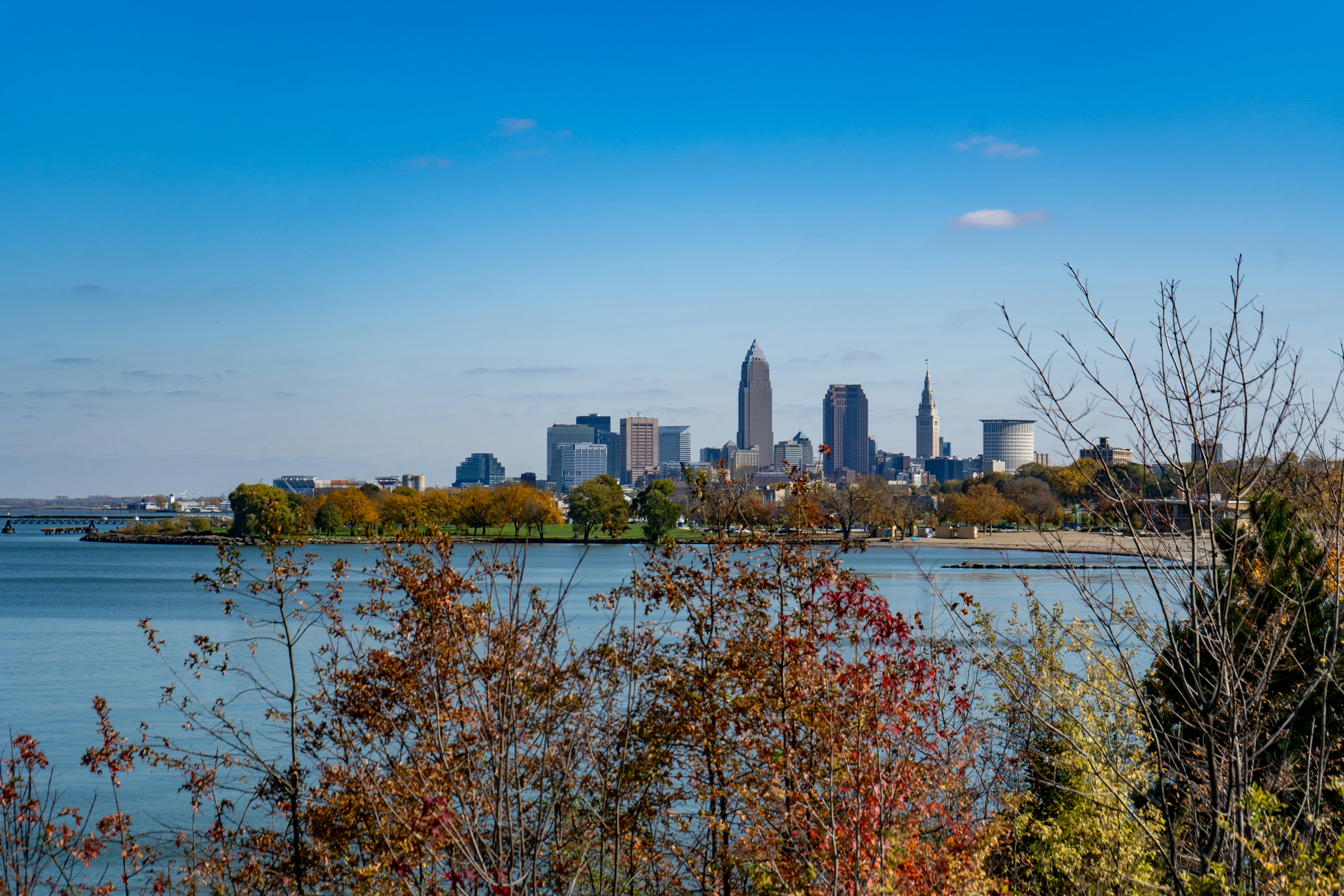 ALT= Debt Collection Agency Cleveland Ohio + picute + long shot of down town Cleveland OH + lake erie + blue sky with clouds