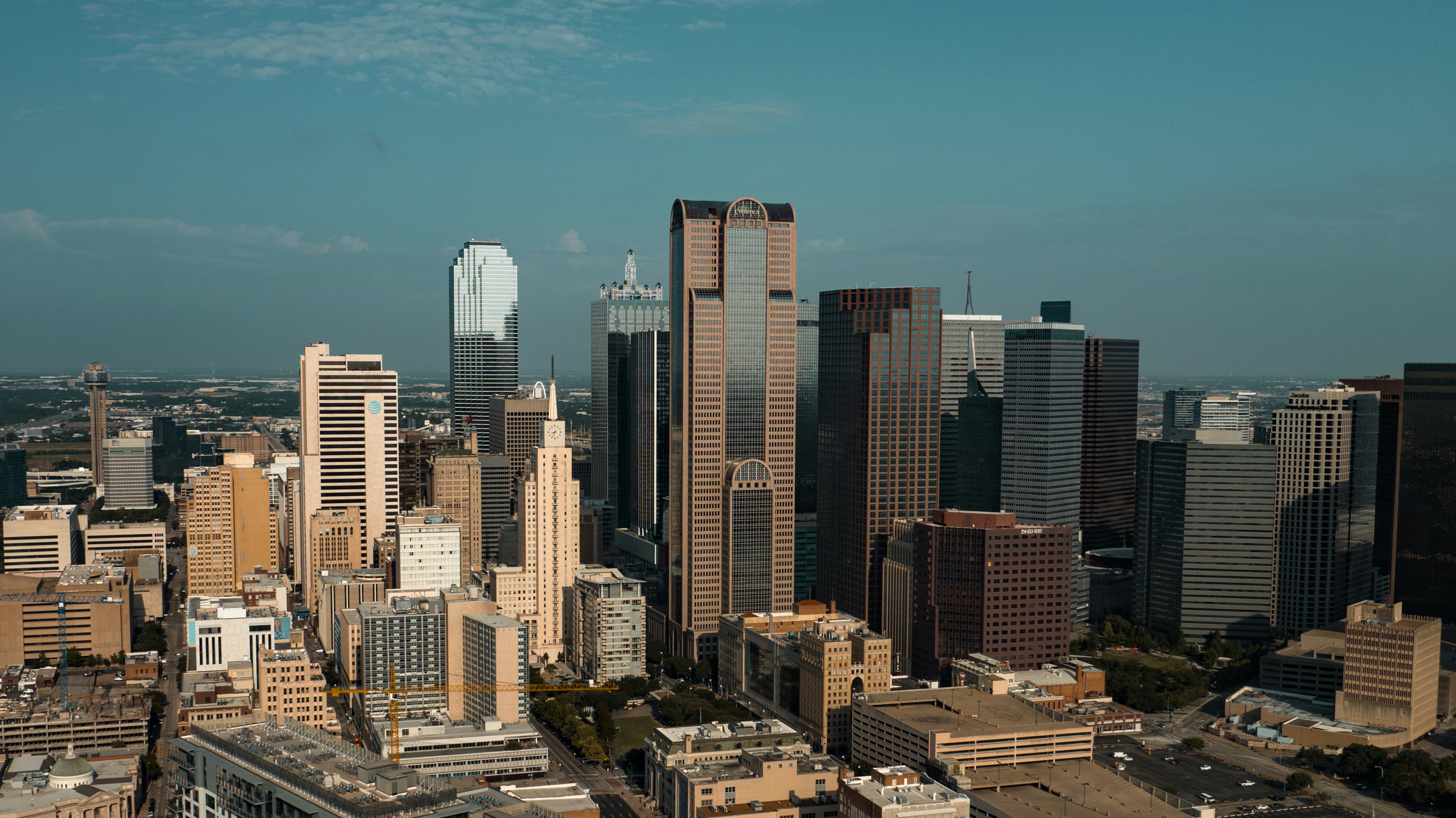 ALT= Debt Collection Agency in Dallas Texas + Fort Worth TX +picture of downtown dallas +ariel view+ buildings + blue sky