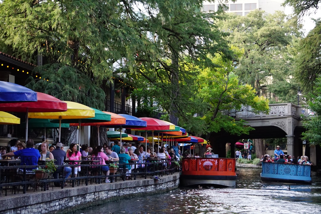 ALT= Debt Collection Agency in San Antonio + picture of buildings in San Antonio + river walk in San Antonio