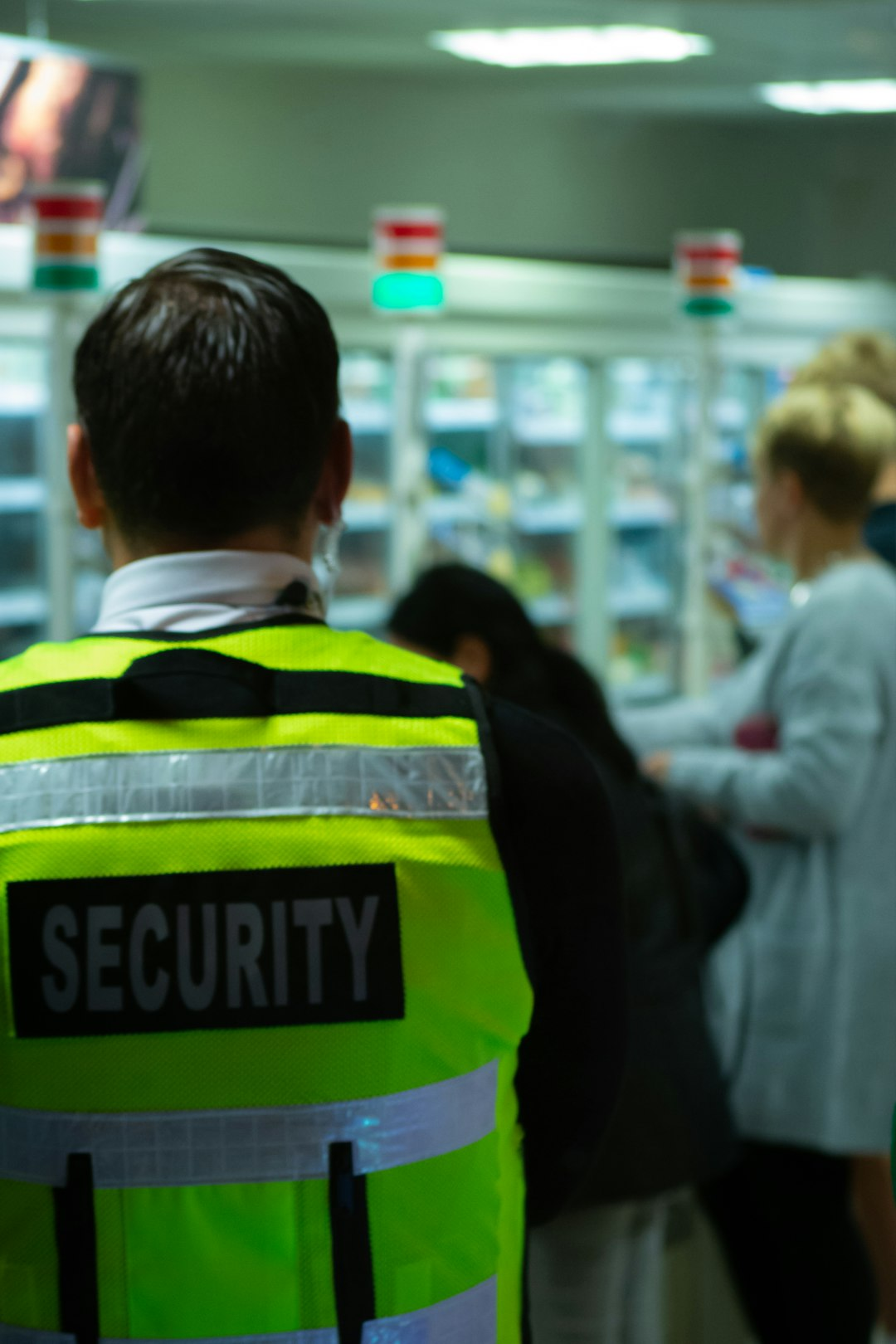 ALT= Debt Collection Agency + armed guard + security guard + corprate security + pciture + security guard on duty + yellow vest